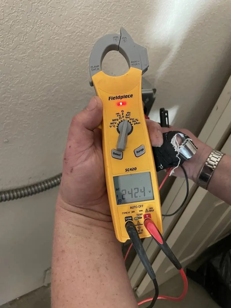 Voltage testing with clamp meter during Circuit Breaker Repair in Elkton